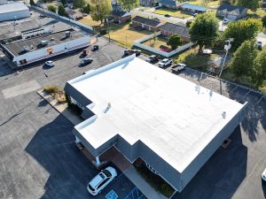 Triple W Roofing roofers working on a roof in Evansville, Indiana